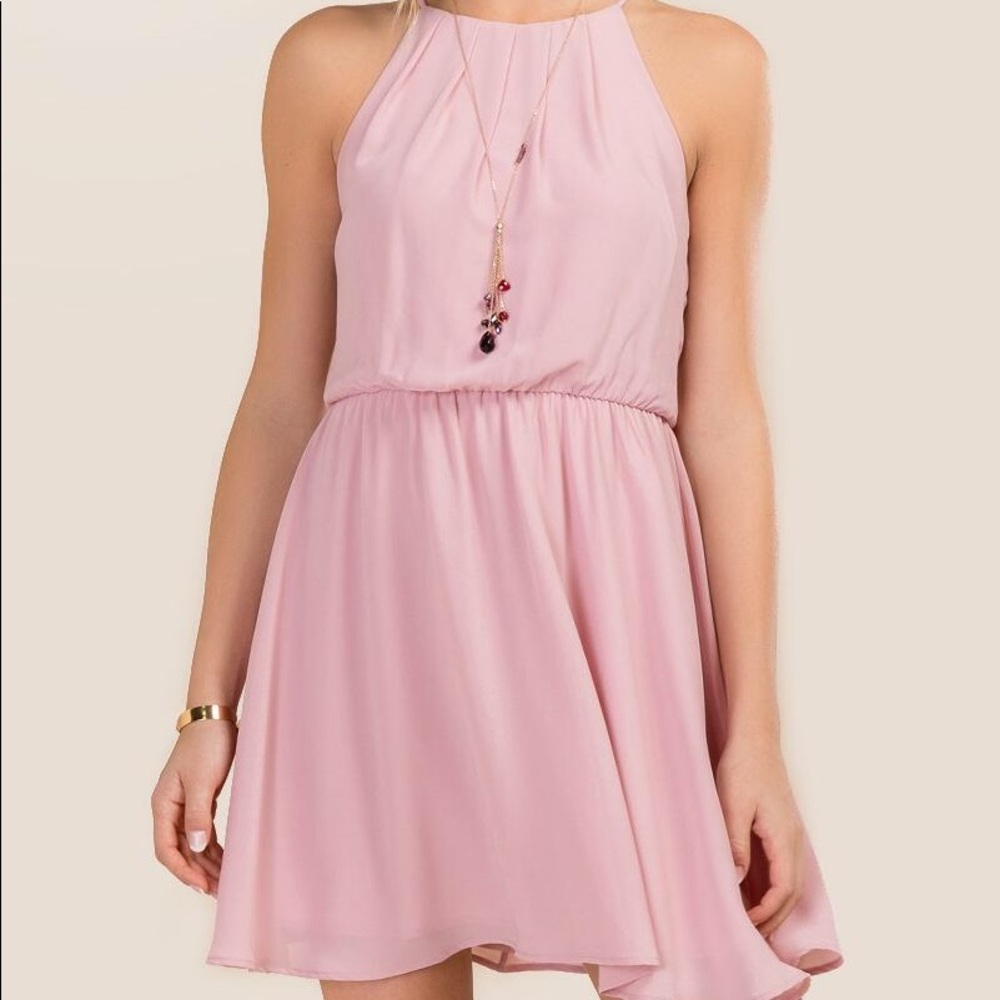 Francesca’s light green flowy dress